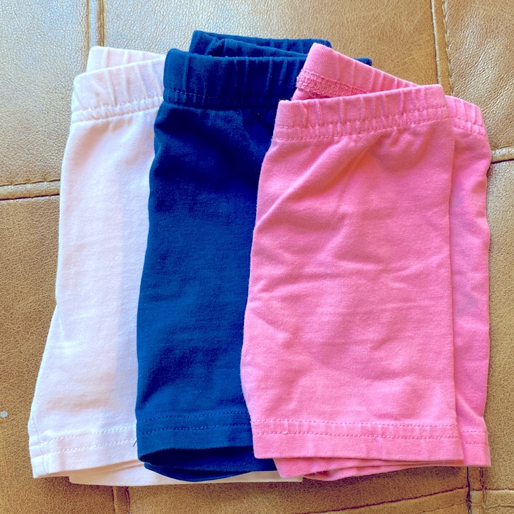 Set of 3 biker shorts: light pink, navy, bubble gum pink.